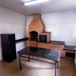 Cozinha externa com churrasqueira